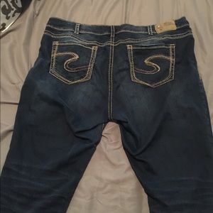 Plus size dark wash silver jeans